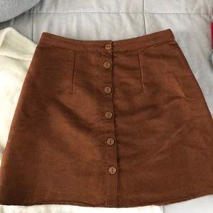 Darker tan suede skirt